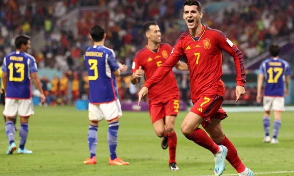 japan spain advance to world cup knockouts as germany crash out